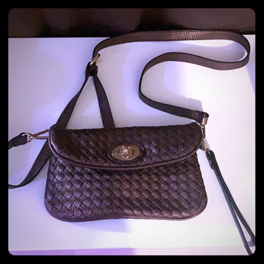 Crossbody convertible to  wristlet!